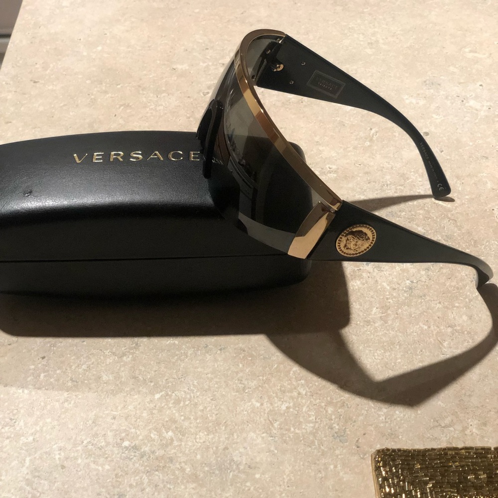 Brand new Women’s black and gold Versace logo